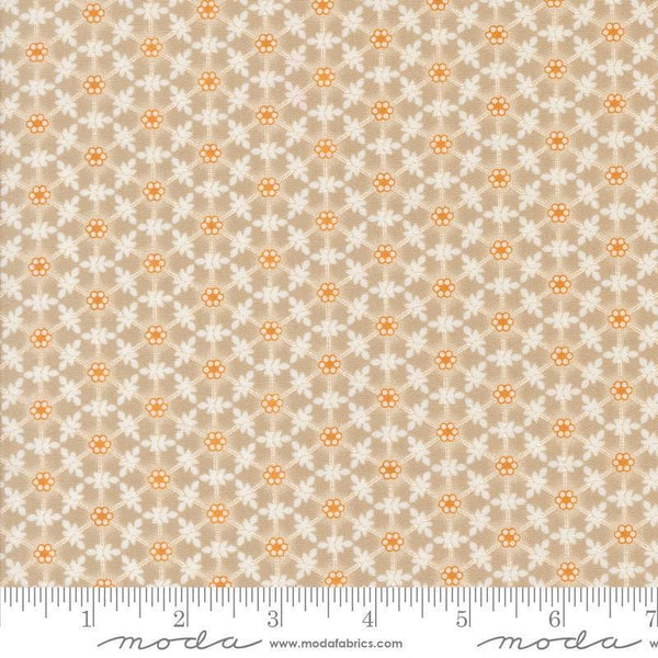 Image of the Agatha Road Wreaths Smoke quilting cotton fabric by Moda Fabrics. Features flowers on a brown background. Cute Little Fabric Shop