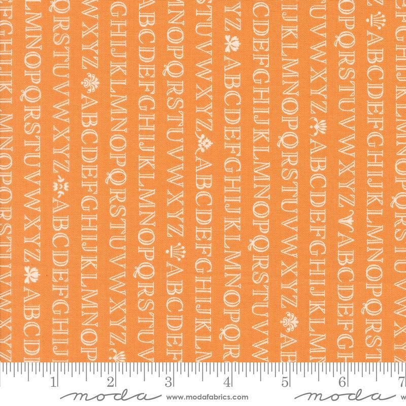Image of the Agatha Road Alphabet Pumpkin quilting cotton fabric by Moda Fabrics. Features letters on an orange background. Cute Little Fabric Shop