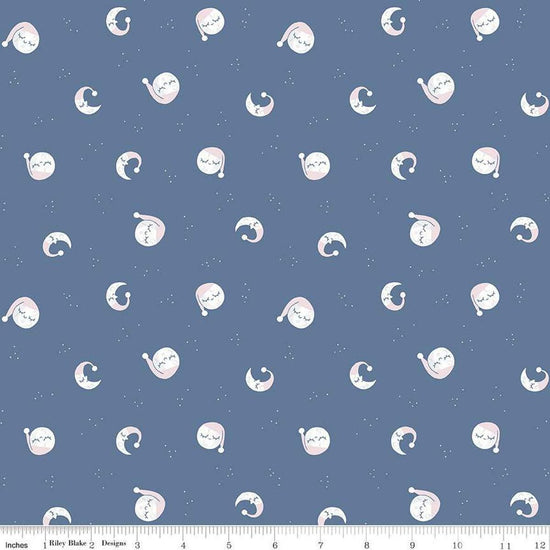 Image of the Twinkle Little Star Goodnight Moon Denim quilting cotton fabric by Riley Blake Designs. Features stars on a blue background. Cute Little Fabric Shop