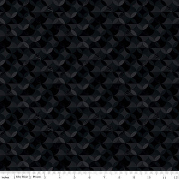 Image of the New Box of Crayons Kaleidoscope Black Quilting Cotton Fabric by Riley Blake Designs. Features orange peel on a black background. Cute Little Fabric Shop