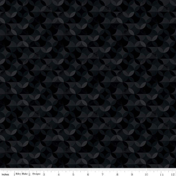 Image of the New Box of Crayons Kaleidoscope Black Quilting Cotton Fabric by Riley Blake Designs. Features orange peel on a black background. Cute Little Fabric Shop