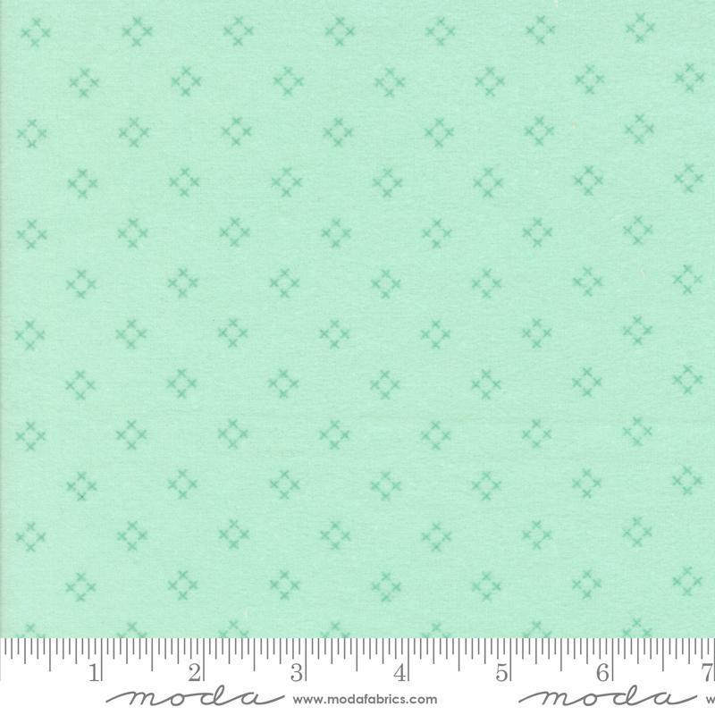 Image of the Sherbet Sunshine Flan Diamond Sea Glass by Corey Yoder for Moda Fabrics. Features diamonds on a green background. Cute Little Fabric Shop