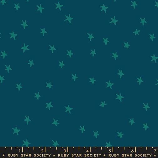 Image of the Starry New Blender Stars Galaxy quilting cotton fabric by Ruby Star Society for Moda Fabrics. Features small stars on a blue background. Cute Little Fabric Shop