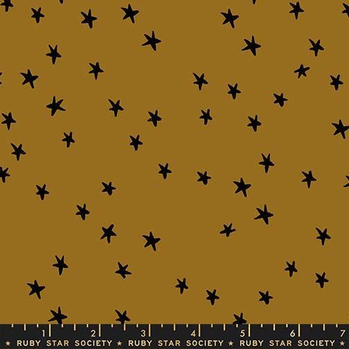 Image of the Starry New Blender Stars Suede quilting cotton fabric by Ruby Star Society for Moda Fabrics. Features small stars on a mustard background. Cute Little Fabric Shop
