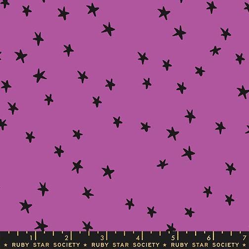 Image of the Starry New Blender Stars Witchy quilting cotton fabric by Ruby Star Society for Moda Fabrics. Features small stars on a purple background. Cute Little Fabric Shop