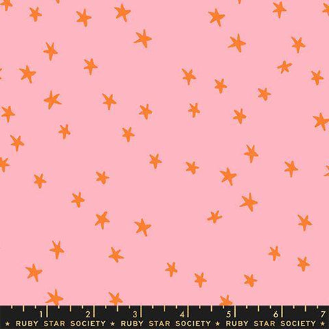Image of the Starry New Blender Stars Rosebud quilting cotton fabric by Ruby Star Society for Moda Fabrics. Features small stars on a pink background. Cute Little Fabric Shop