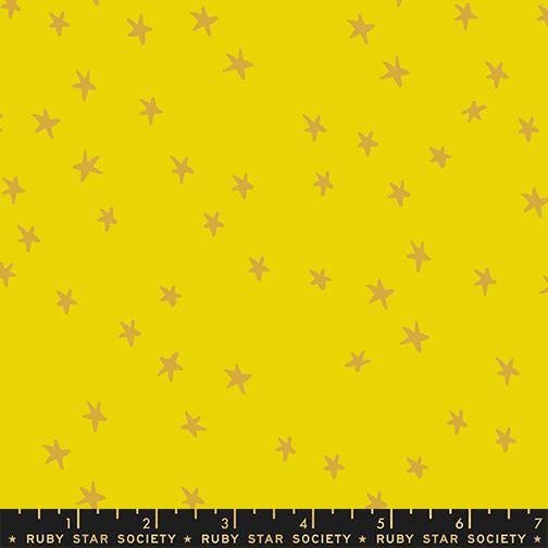 Image of the Starry New Blender Stars Golden Hour quilting cotton fabric by Ruby Star Society for Moda Fabrics. Features small stars on a yellow background. Cute Little Fabric Shop