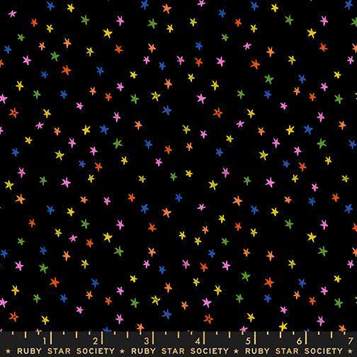 Image of the Mini Starry New Blender Stars Vivid Rainbow quilting cotton fabric by Ruby Star Society for Moda Fabrics. Features small stars on a black background. Cute Little Fabric Shopc