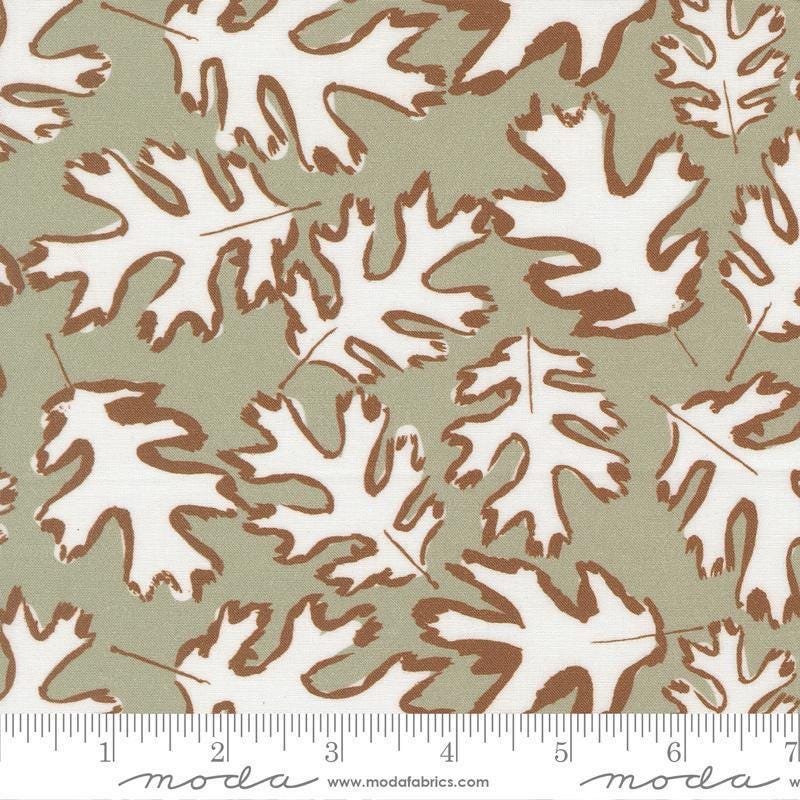 Image of the For My Boys Oliver Leaf Sage quilting cotton fabric by Sewn By Amy Schelle for Moda Fabrics. Features leaves on a green background. Cute Little Fabric Shop