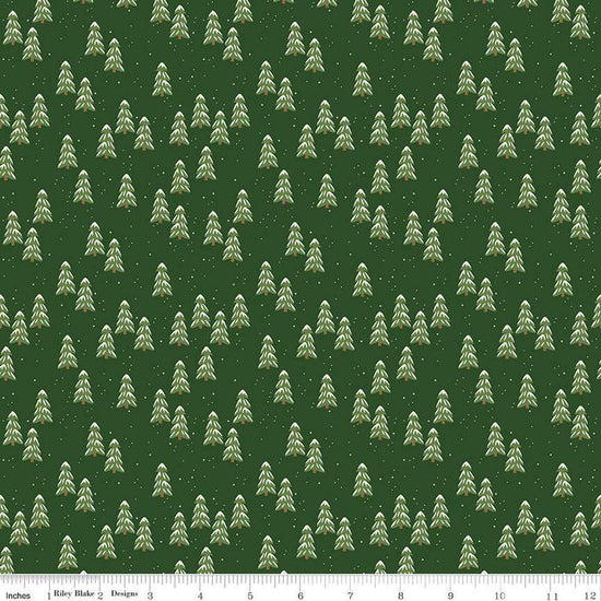 Image of the More Christmas Wishes Pines Forest quilting cotton fabric by Riley Blake Designs. Features pines on a green background. Cute Little Fabric Shop