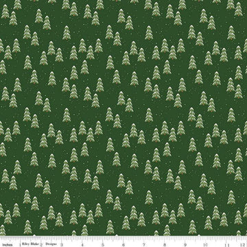 Image of the More Christmas Wishes Pines Forest quilting cotton fabric by Riley Blake Designs. Features pines on a green background. Cute Little Fabric Shop