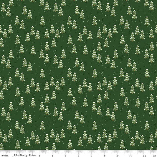 Image of the More Christmas Wishes Pines Forest quilting cotton fabric by Riley Blake Designs. Features pines on a green background. Cute Little Fabric Shop
