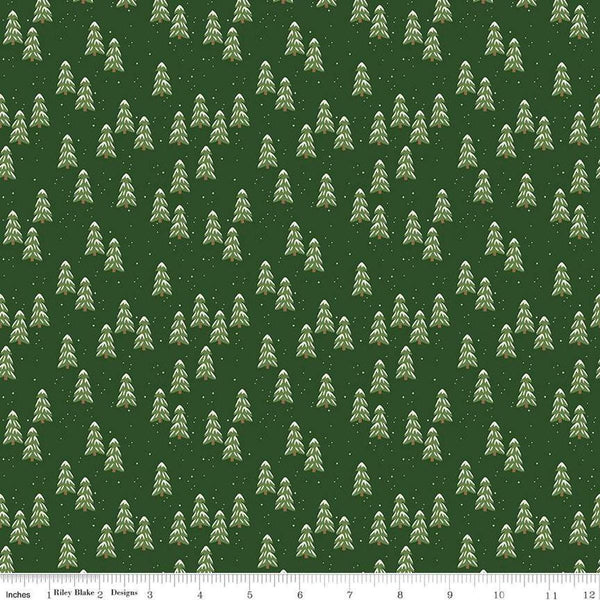 Image of the More Christmas Wishes Pines Forest quilting cotton fabric by Riley Blake Designs. Features pines on a green background. Cute Little Fabric Shop