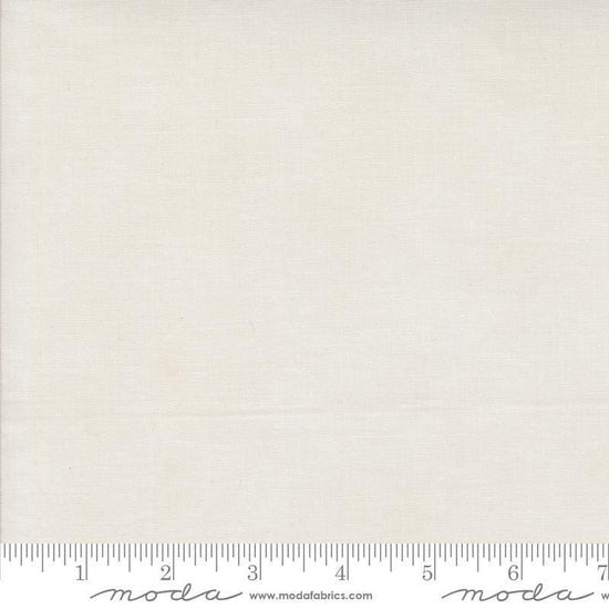 Image of the Winter Friends Solid Snowy White quilting cotton fabric by Moda Fabrics. Features texture on a white background. Cute Little Fabric Shop