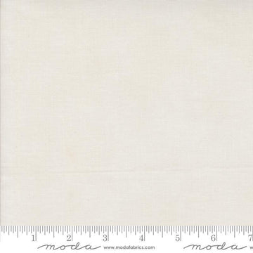 Image of the Winter Friends Solid Snowy White quilting cotton fabric by Moda Fabrics. Features texture on a white background. Cute Little Fabric Shop