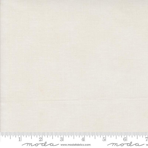Image of the Winter Friends Solid Snowy White quilting cotton fabric by Moda Fabrics. Features texture on a white background. Cute Little Fabric Shop
