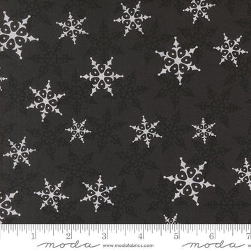 Image of the Winter Friends Woodland Charcoal Black quilting cotton fabric by Moda Fabrics. Features snowflakes on a black background. Cute Little Fabric Shop