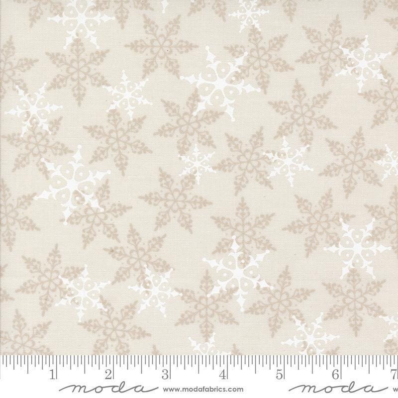 Image of the Winter Friends Woodland White quilting cotton fabric by Moda Fabrics. Features snowflakes on a white background. Cute Little Fabric Shop