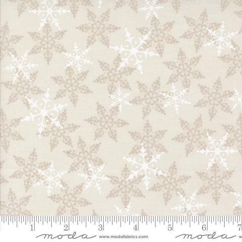 Image of the Winter Friends Woodland White quilting cotton fabric by Moda Fabrics. Features snowflakes on a white background. Cute Little Fabric Shop
