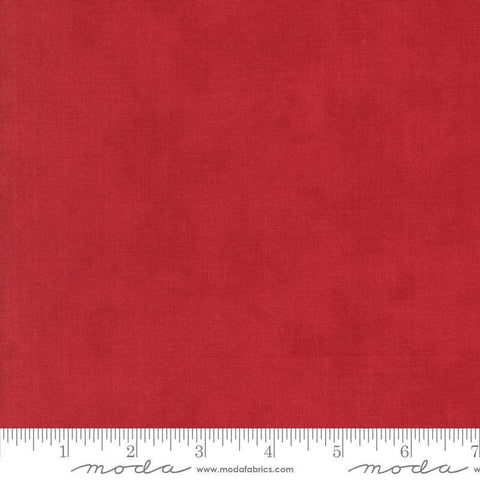 Image of the Winter Friends Solid Berry Red quilting cotton fabric by Moda Fabrics. Features texture on a red background. Cute Little Fabric Shop