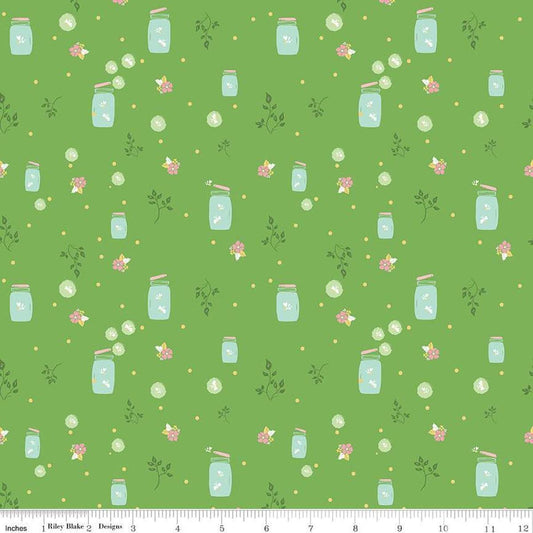Image of the Summer Skies and Fireflies Fireflies Green Quilting Cotton Fabric by Riley Blake Designs. Features fireflies on a green background. Cute Little Fabric Shop