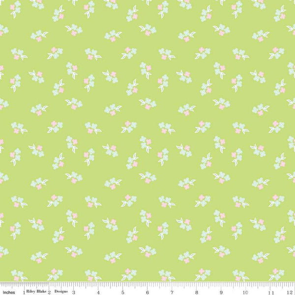 Image of the Summer Skies and Fireflies Floral Lime Quilting Cotton Fabric by Riley Blake Designs. Features flowers on a blue background. Cute Little Fabric Shop