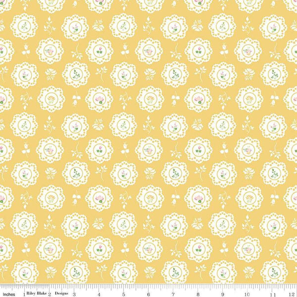 Image of the Summer Skies and Fireflies Doilies Yellow Quilting Cotton Fabric by Riley Blake Designs. Features flowers on a yellow background. Cute Little Fabric Shop