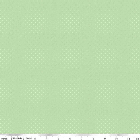 Image of the American Jane Pindots Sage quilting cotton fabric by American Jane for Riley Blake Designs. Features tiny dots on a green background. Cute Little Fabric Shop