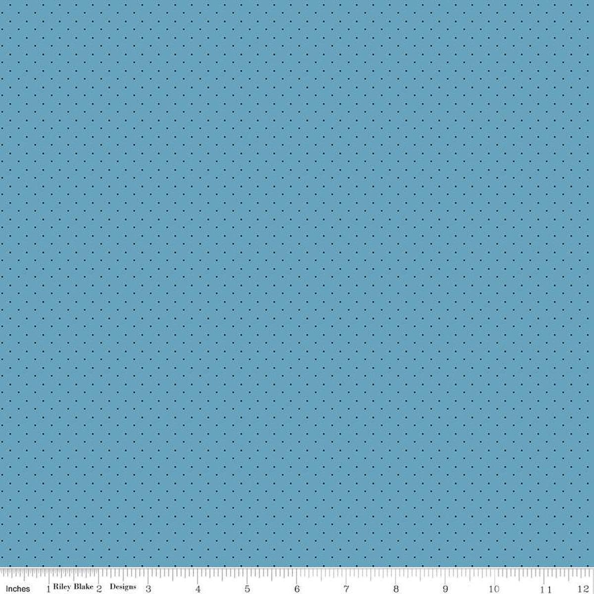 Image of the American Jane Pindots Ocean quilting cotton fabric by American Jane for Riley Blake Designs. Features tiny dots on a blue background. Cute Little Fabric Shop