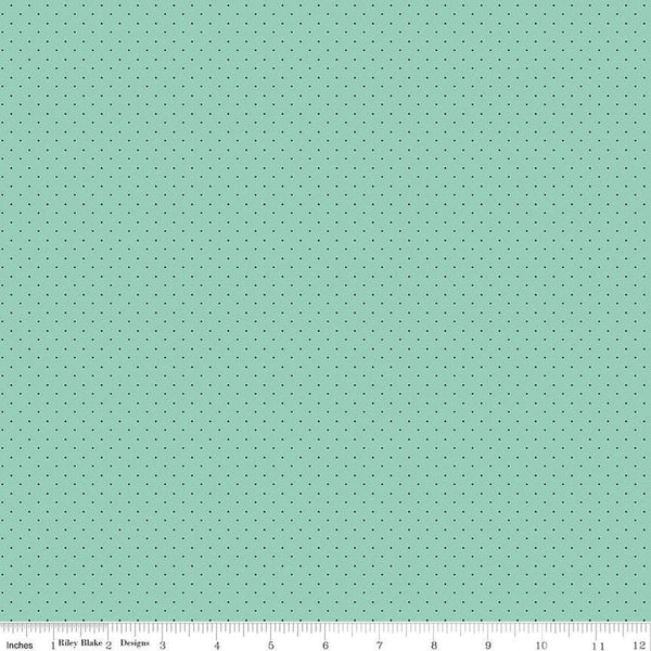 Image of the American Jane Pindots Mist quilting cotton fabric by American Jane for Riley Blake Designs. Features tiny dots on a green background. Cute Little Fabric Shop