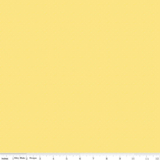 Image of the American Jane Pindots Canary quilting cotton fabric by American Jane for Riley Blake Designs. Features tiny dots on a yellow background. Cute Little Fabric Shop