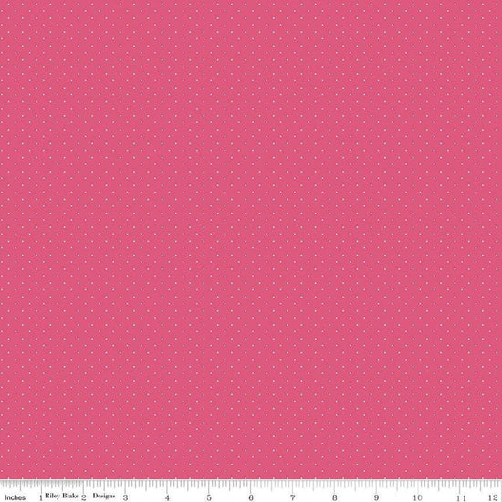 Image of the American Jane Pindots Raspberry quilting cotton fabric by American Jane for Riley Blake Designs. Features tiny dots on a hot pink background. Cute Little Fabric Shop