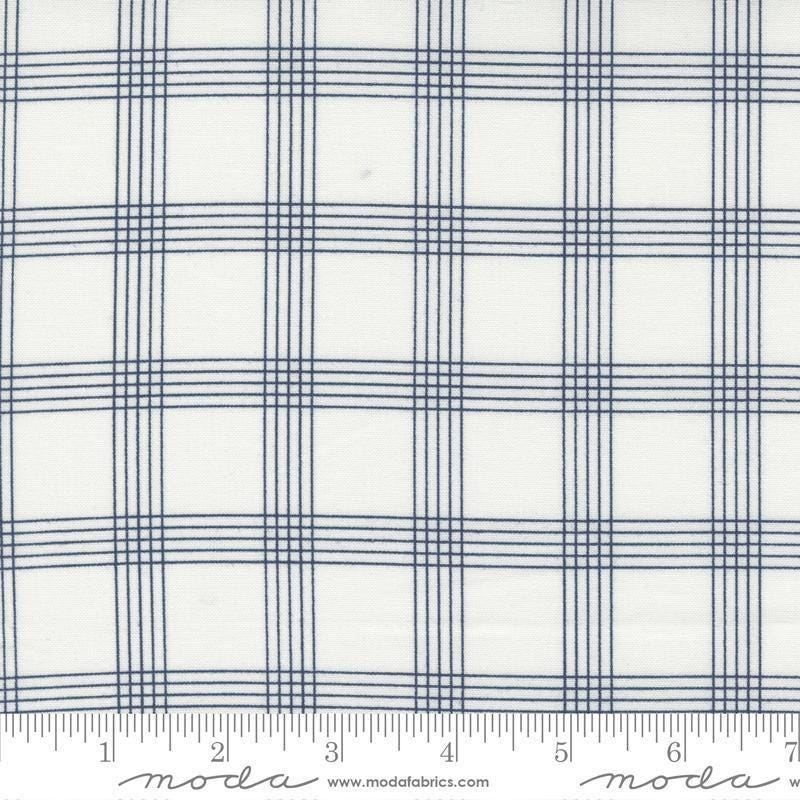 Image of the Nantucket Summer Checks Cream Navy quilting cotton fabric by Camille Roskelley for Moda Fabrics. Features plaid on a gray background. Cute Little Fabric Shop