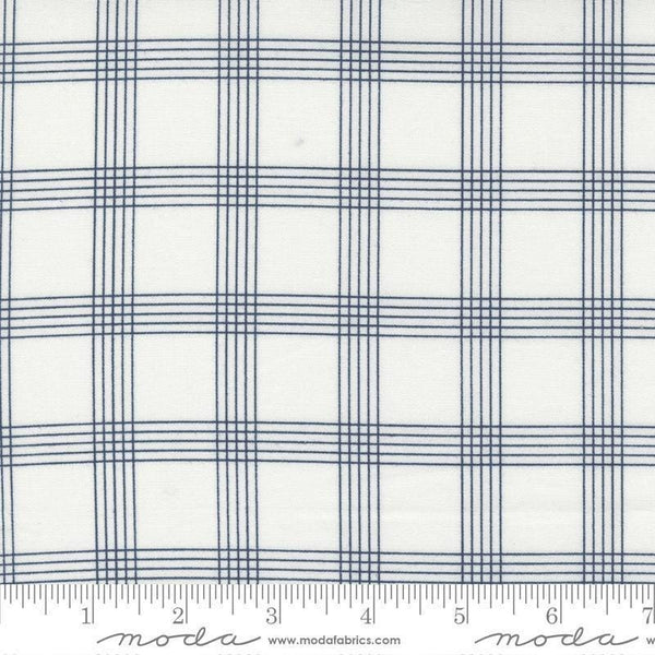 Image of the Nantucket Summer Checks Cream Navy quilting cotton fabric by Camille Roskelley for Moda Fabrics. Features plaid on a gray background. Cute Little Fabric Shop