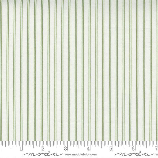 Image of the Nantucket Summer Stripes Cream Grass quilting cotton fabric by Camille Roskelley for Moda Fabrics. Features stripes on a green background. Cute Little Fabric Shop