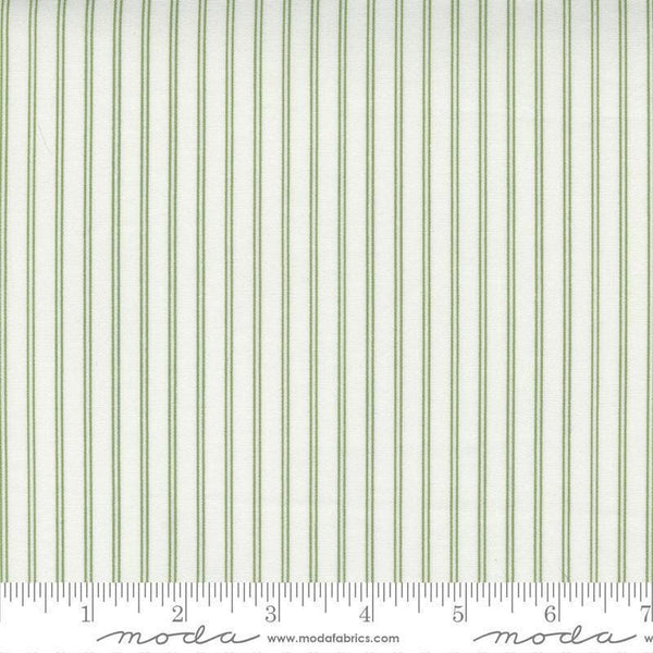 Image of the Nantucket Summer Stripes Cream Grass quilting cotton fabric by Camille Roskelley for Moda Fabrics. Features stripes on a green background. Cute Little Fabric Shop