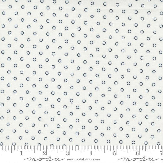 Image of the Nantucket Summer Dots Cream quilting cotton fabric by Camille Roskelley for Moda Fabrics. Features circles on an off-white background. Cute Little Fabric Shop