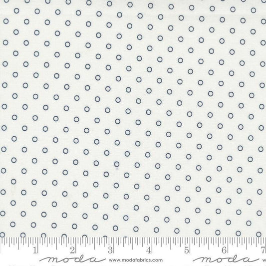 Image of the Nantucket Summer Dots Cream quilting cotton fabric by Camille Roskelley for Moda Fabrics. Features circles on an off-white background. Cute Little Fabric Shop