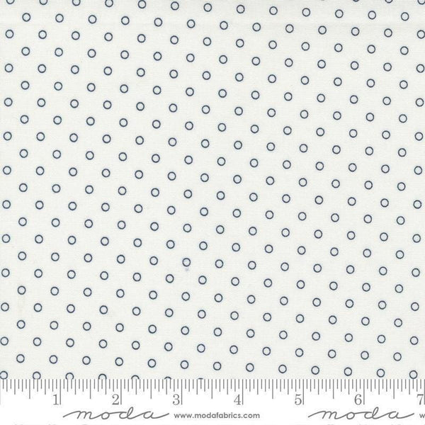 Image of the Nantucket Summer Dots Cream quilting cotton fabric by Camille Roskelley for Moda Fabrics. Features circles on an off-white background. Cute Little Fabric Shop