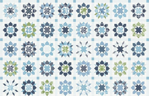 Image of the Nantucket Summer Quilt Blocks Panel Multi quilting cotton fabric by Camille Roskelley for Moda Fabrics. Features flowers on a white background. Cute Little Fabric Shop