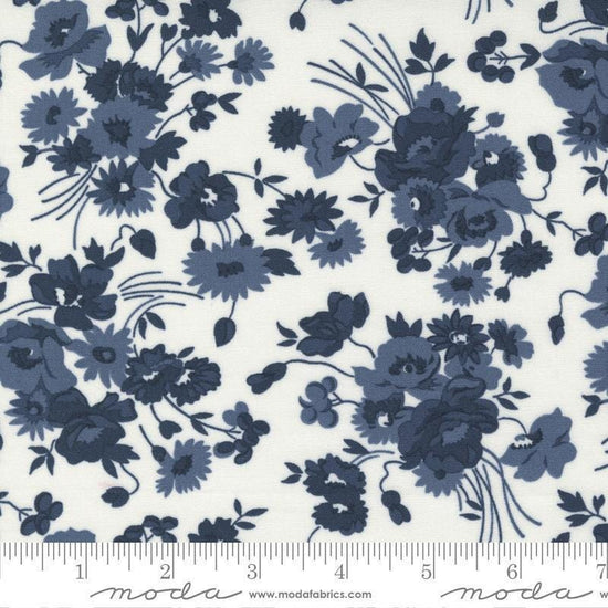 Image of the Nantucket Summer Florals Cream Navy quilting cotton fabric by Camille Roskelley for Moda Fabrics. Features florals on a white background. Cute Little Fabric Shop