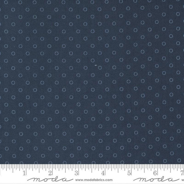 Image of the Nantucket Summer Dots Navy quilting cotton fabric by Camille Roskelley for Moda Fabrics. Features circles on a blue background. Cute Little Fabric Shop
