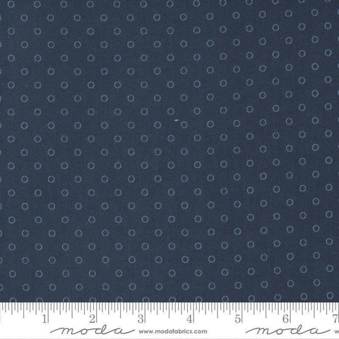 Image of the Nantucket Summer Dots Navy quilting cotton fabric by Camille Roskelley for Moda Fabrics. Features circles on a blue background. Cute Little Fabric Shop