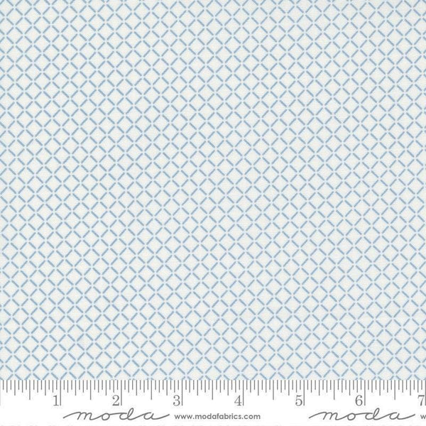 Image of the Nantucket Summer Sail Cream Blue quilting cotton fabric by Camille Roskelley for Moda Fabrics. Features squares on a blue background. Cute Little Fabric Shop