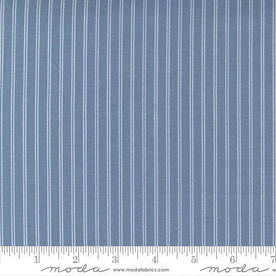 Image of the Nantucket Summer Stripes Lake quilting cotton fabric by Camille Roskelley for Moda Fabrics. Features stripes on a blue background. Cute Little Fabric Shop