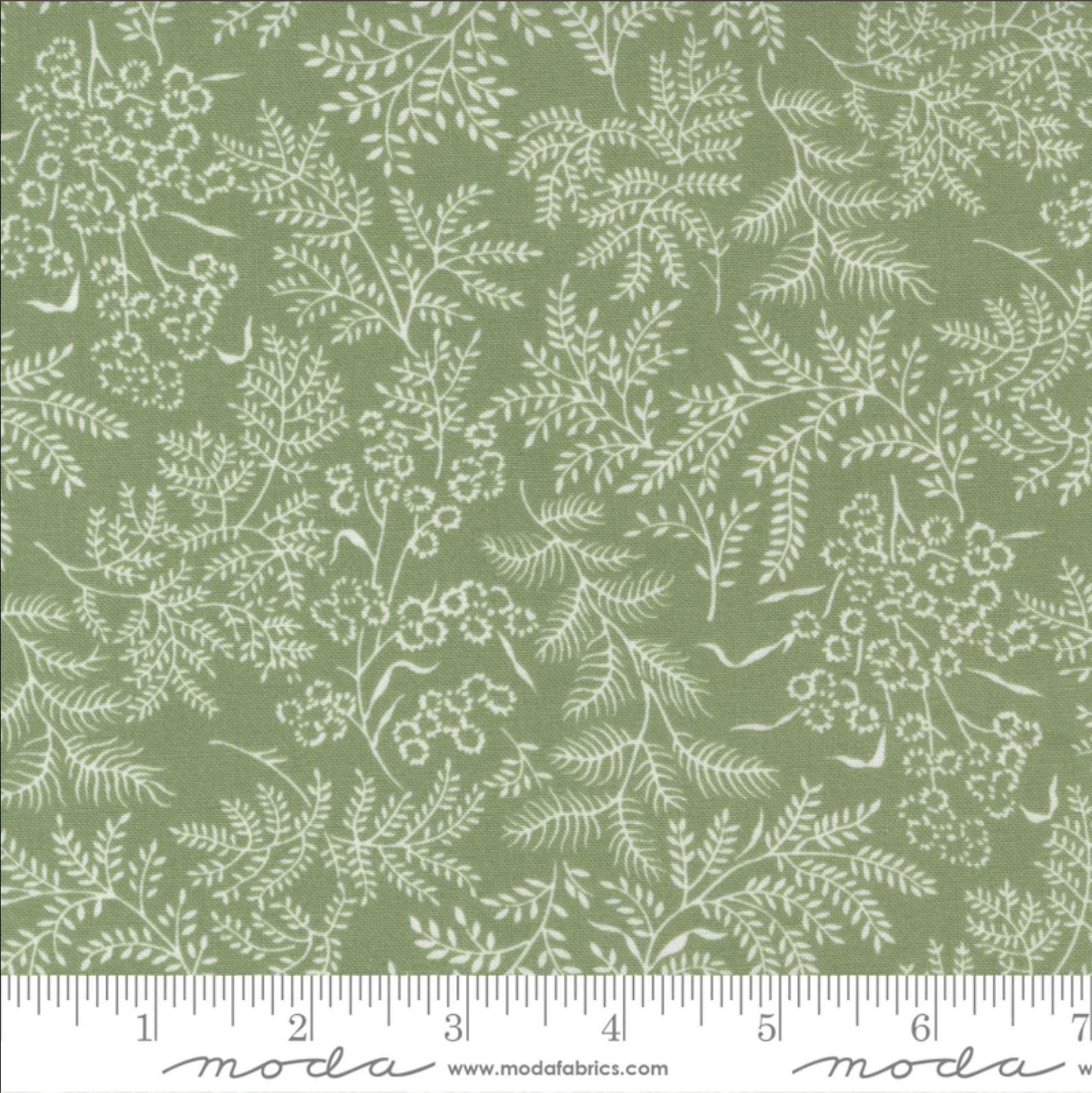 Image of the Nantucket Summer Dots Grass quilting cotton fabric by Camille Roskelley for Moda Fabrics. Features flowers on a green background. Cute Little Fabric Shop