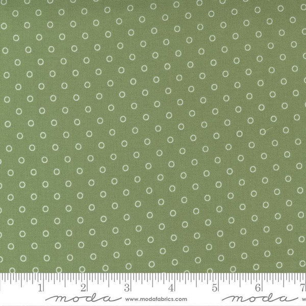 Image of the Nantucket Summer Dots Grass quilting cotton fabric by Camille Roskelley for Moda Fabrics. Features circles on a green background. Cute Little Fabric Shop
