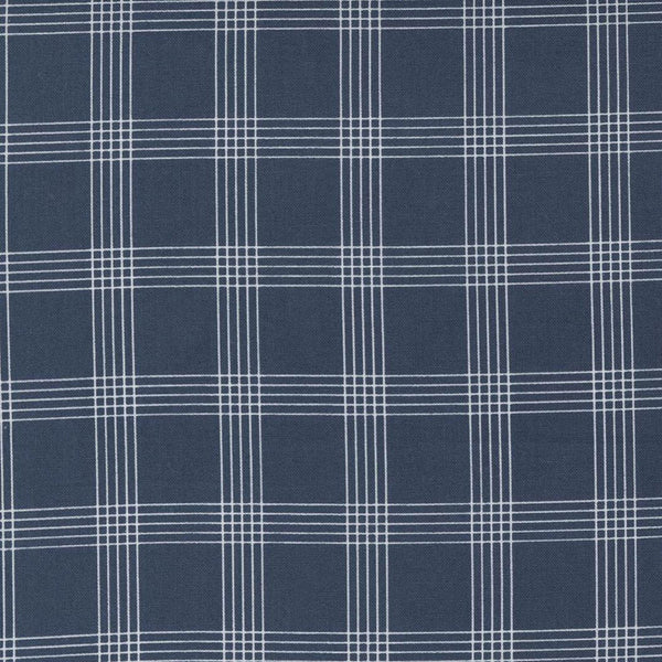Image of the Nantucket Summer Checks Navy quilting cotton fabric by Camille Roskelley for Moda Fabrics. Features plaid on a blue background. Cute Little Fabric Shop