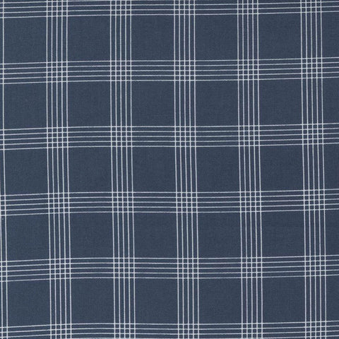 Image of the Nantucket Summer Checks Navy quilting cotton fabric by Camille Roskelley for Moda Fabrics. Features plaid on a blue background. Cute Little Fabric Shop