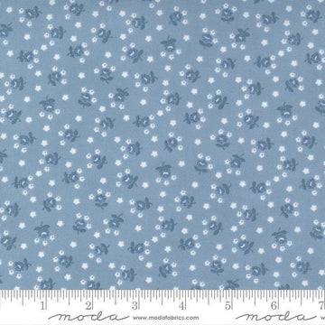 Image of the Nantucket Summer Fairground Light Blue quilting cotton fabric by Camille Roskelley for Moda Fabrics. Features florals on a blue background. Cute Little Fabric Shop